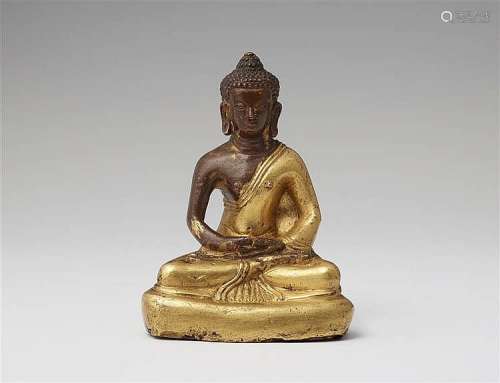 A Tibetan partially gilt bronze figure of Buddha Shakyamuni. 18th/19th century