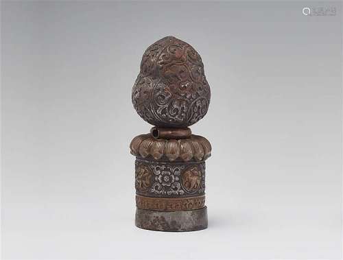 A Tibetan wrought iron and copper seal