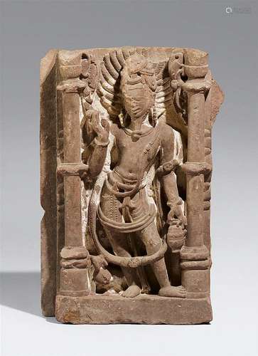 A North or Central Indian pink sandstone architectural fragment of Agni, the god of fire. 10th/12th century