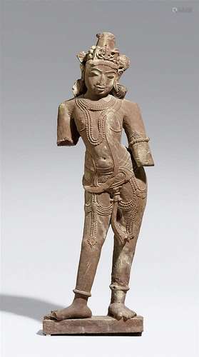 A North/Central Indian pink sandstone figure of a standing male figure. 10th/12th century