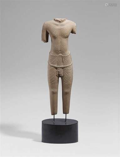 A Cambodian sandstone male torso