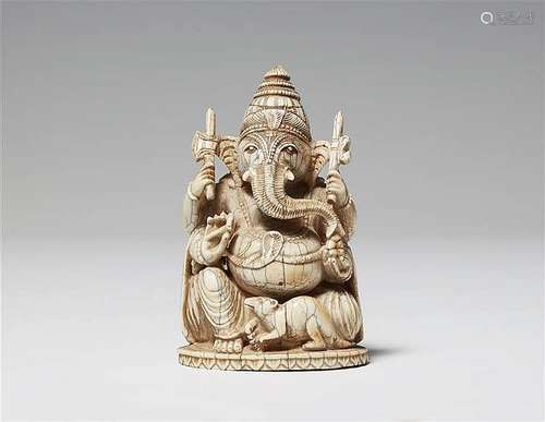 An ivory figure of a four-armed Ganesha. Around 1900