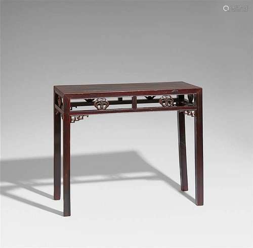 A lacquered jumu wood table. 19th century