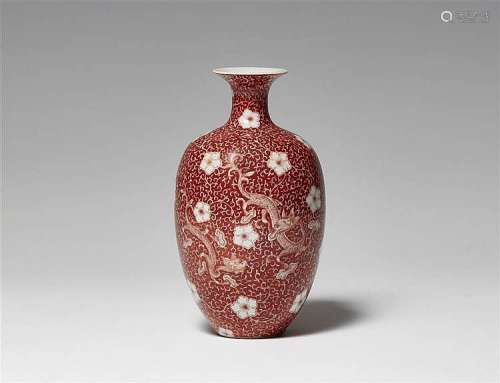 A coral-ground reverse-decorated vase. 19th/20th century