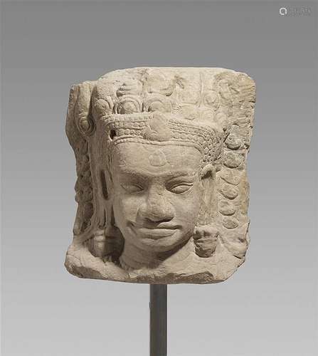 A very large Bayon style sandstone head of a Dvarapala. 12th/13th century