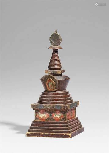 A Tibetan painted wood stupa. 19th century