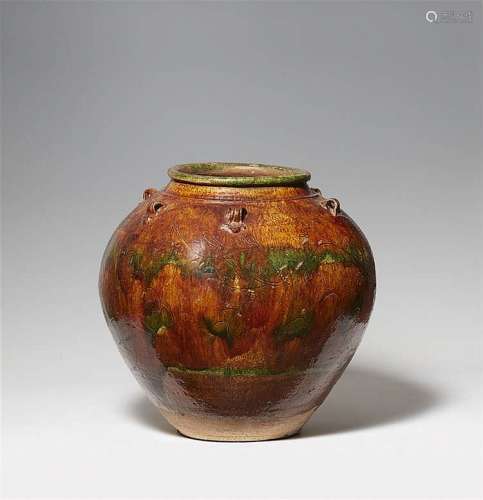 A large stoneware storage jar. 12th/13th century