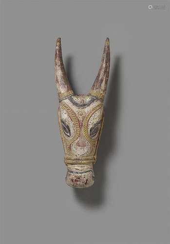 An Orissa polychromed wood ceremonial head of a bull. 19th century