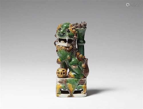 A biscuit-glazed lion with joss stick holder. Email sur biscuit. Kangxi period (1662-1722)