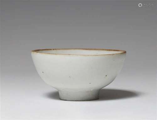 A greyish-white glazed bowl. 16th/17th century