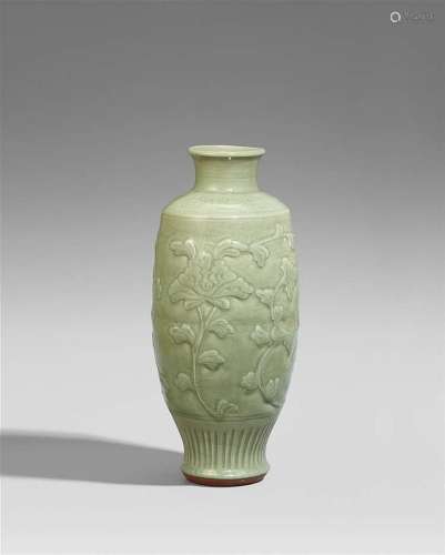 A Longquan celadon peony vase
