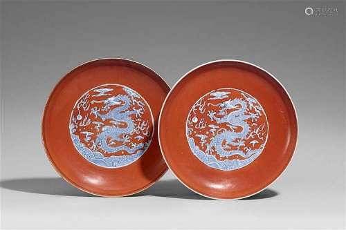 A pair of iron-red ground dragon dishes. 19th century