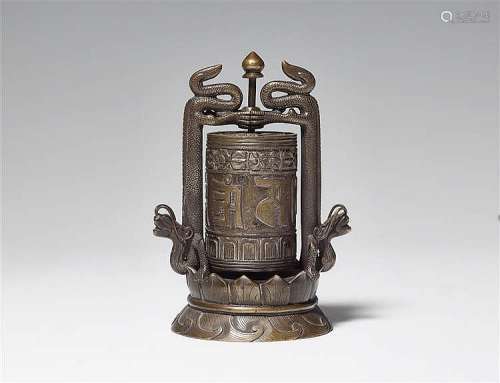 A Sinotibetan bronze table prayer wheel. 19th century