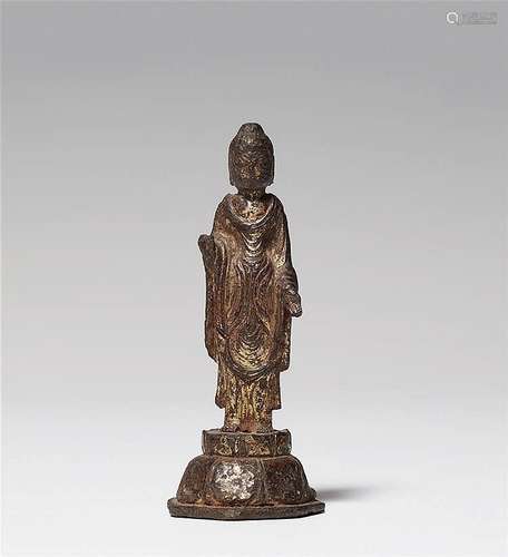 A small gilt bronze figure of Buddha Amitabha. Early Tang dynasty