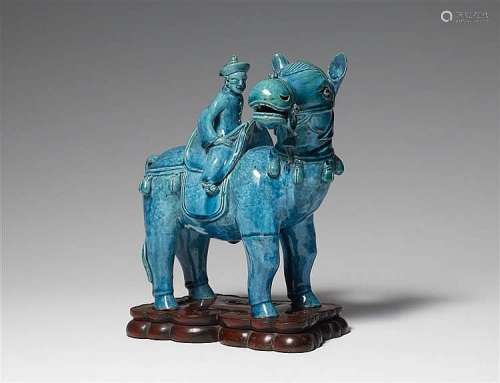 A turquoise-glazed figure of an equestrian. Around 1900