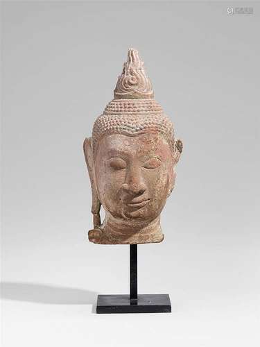 An Ayutthaya pink sandstone head of Buddha. Thailand. 16th century