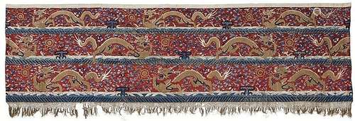 A red felt and silk embroidery wall hanging. Late 19th century