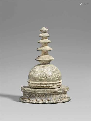 A Gandhara greenish grey schist reliquiary in shape of a stupa. 2nd/3rd century