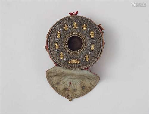 A Tibetan circular silver and copper ga´u