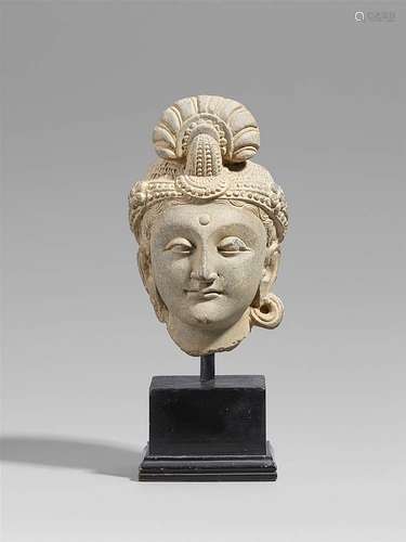 A Gandhara grey schist head of a odhisattva. Pakistan. 2nd/3rd century