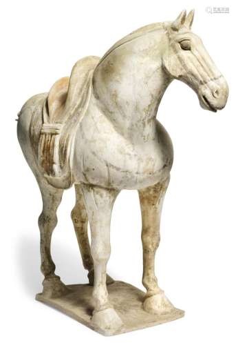 A Tang terracotta horse with red and black paint. China 618-906. H. 49 cm. L. 55 cm.