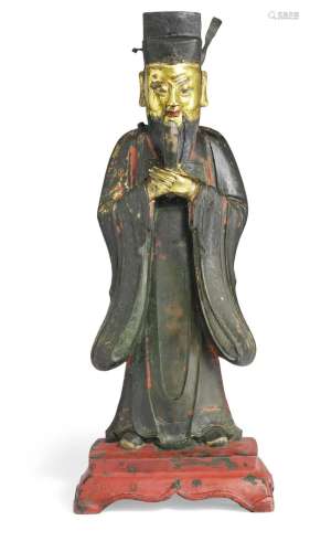 A large Chinese figure of patinated bronze in the form of a Daoist Divinity, heavenly official. Ming 1368-1644. H. 42 cm