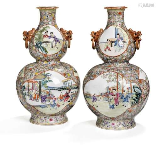 A pair of double gourd shaped porcelain vases. Republic 1912-1949. H. 38 cm. (2)