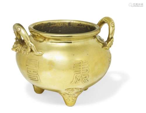 A Chinese bronze censer, globe shaped, handle in the shape of chilong, the side with letters, supported on three legs