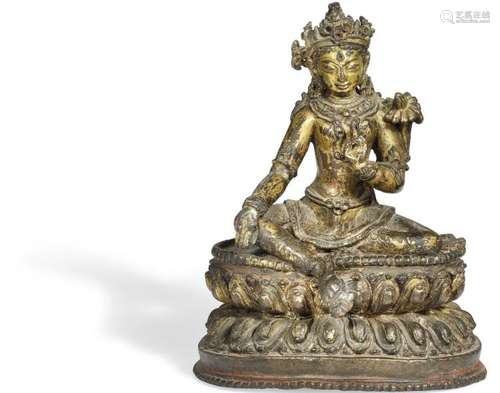 A Nepali gilt bronze figure of Green Tara. 17th century. Weight 495 gr. H. 11 cm.