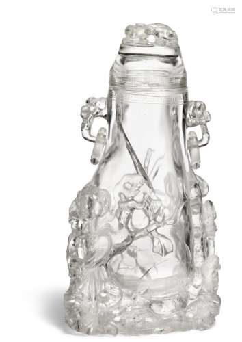A Chinese rock crystal covered vase decorated with free-cut lingzhi, Phoenix and peony. The side with ring handles mounted on lingzhi. Late Qing. H. 26 cm.