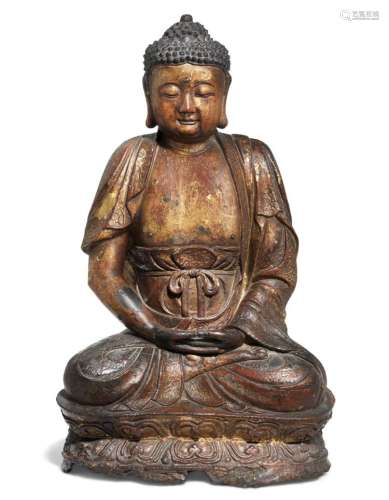A large Chinese gilt and lacquered bronze Buddha. Ming 1368-1644. Weight c. 16000 gr. H. 56 cm.