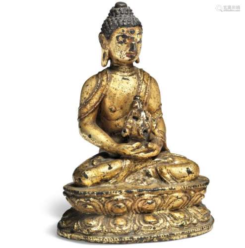 A presumably Tibetan gilt bronze figure of Amitayus. 18/19th century. Weight 335 gr. H. 10.5 cm.