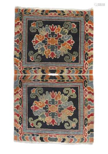 An antique Tibetan saddlecover, Central Asia. 19th century. 142 x 86 cm.