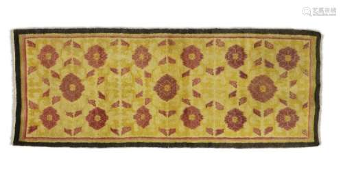 A Ningxia temple rug, Central China. Design with rosettes and foliage. 19th century. 209 x 96 cm.