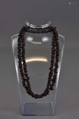 A GRANITE STONE BEADED NECKLACE