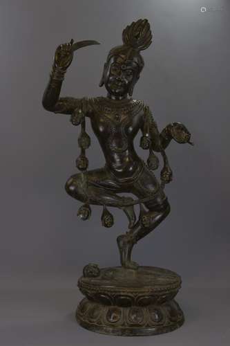 A VERY LARGE SOUTHEAST ASIAN BRONZE GODDESS