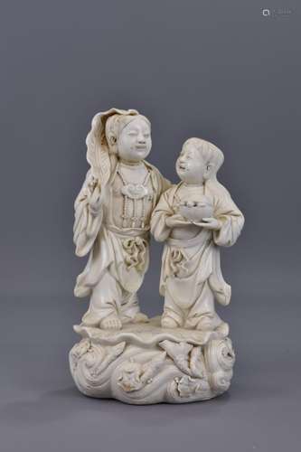 A CHINESE BLANC DE CHINE FIGURE OF IMMORTALS