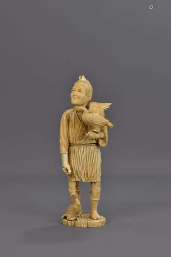 A JAPANESE IVORY FIGURE