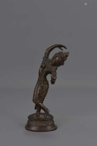 AN INDIAN BRONZE FIGURE