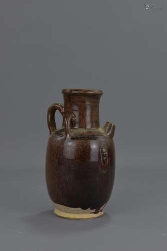 A CHINESE TANG DYNASTY POTTERY EWER