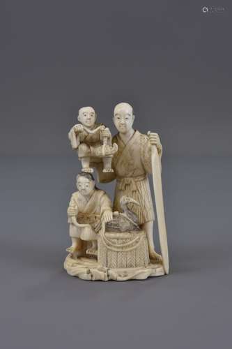 A MEIJI PERIOD JAPANESE IVORY OKIMONO