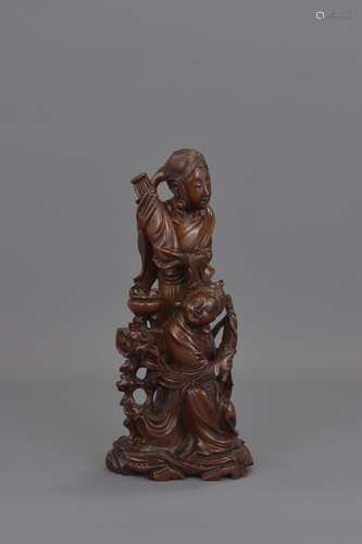 A CHINESE BOXWOOD FIGURE