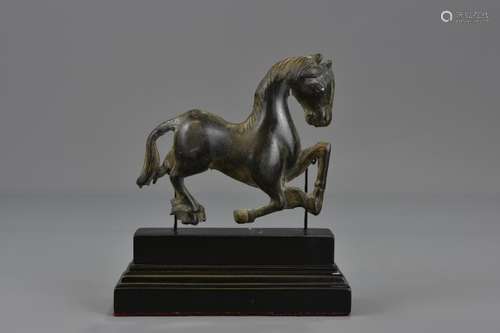 A CHINESE MING DYNASTY METAL HORSE