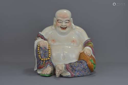 A LARGE CHINESE FAMILLE ROSE PORCELAIN BUDDHA