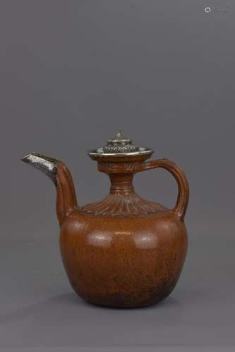 A TIBETAN POTTERY COFFEE POT