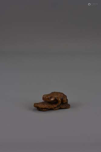 A MEIJI PERIOD BOXWOOD NETSUKE SIGNED MASANAO