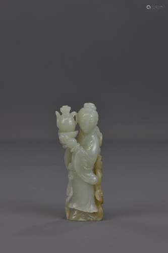 A CHINESE CARVED JADE FIGURE OF GUANYIN