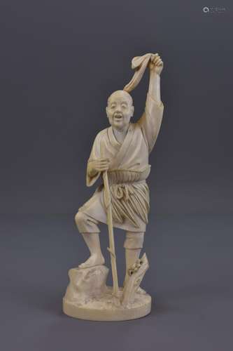 A MEIJI PERIOD JAPANESE IVORY OKIMONO