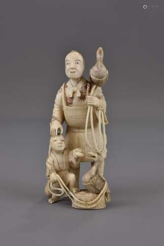 A MEIJI PERIOD JAPANESE IVORY OKIMONO