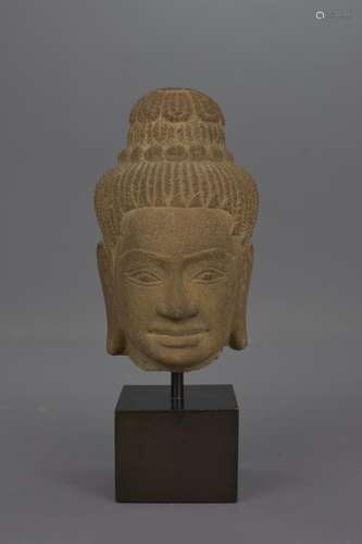 A SOUTHEAST ASIAN STONE HEAD